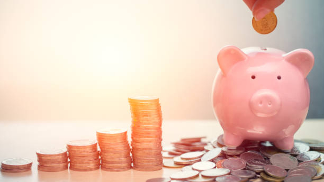 Hand Saving Money concept, Piggy bank with coin for Wealth Income and Profit Financial Business Grow